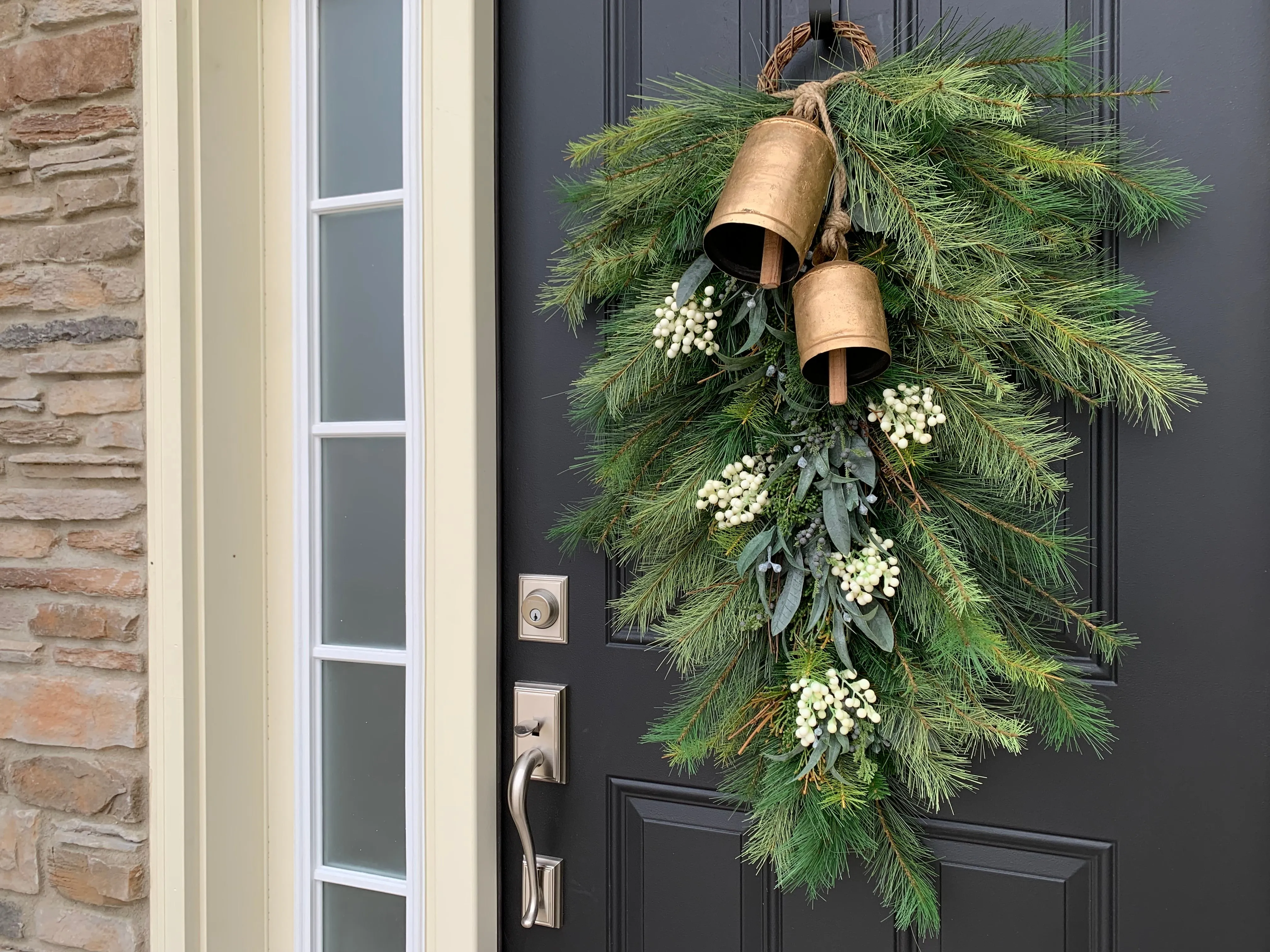 Holiday Pine Swag Teardrop Wreath with White Berries and Hanging Bells